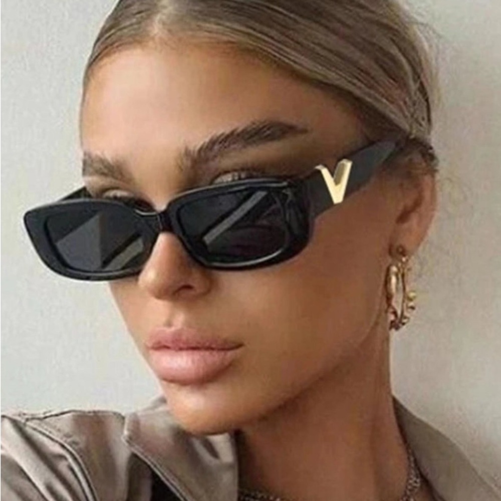 Stylish Black Sunglasses with Gold Accent